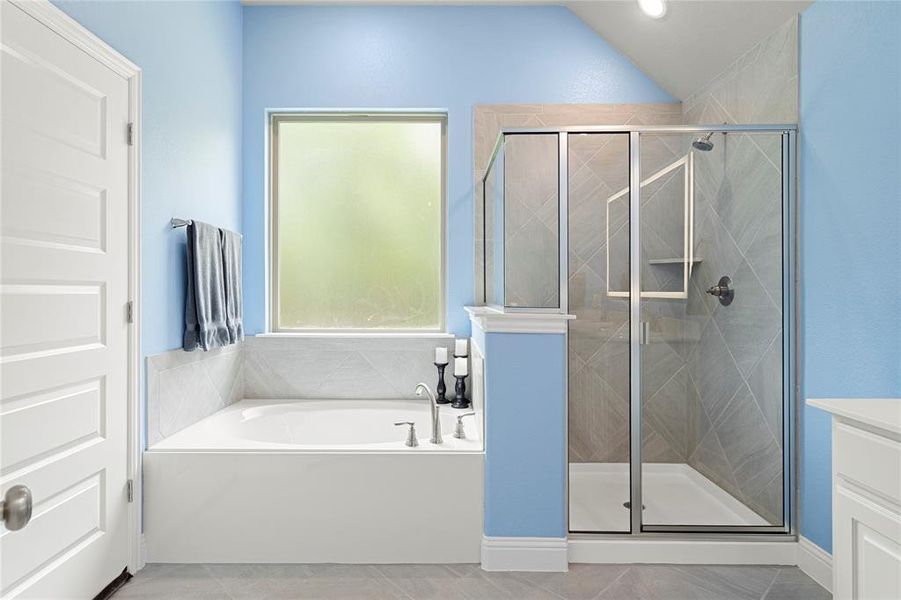 Garden tub and separate shower.