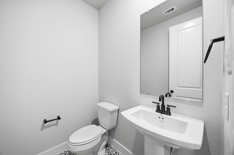 Furnished interior view inside a new home in Sunterra 50s, Katy (Image 11).