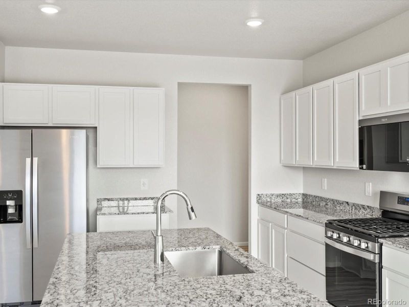 Furnished interior view inside a new home in Poudre Heights: The Lakes Collection, Windsor (Image 8).