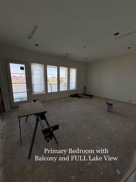 Spacious Primary Suite with direct Balcony access and sweeping lake views. A private retreat with unmatched scenery.