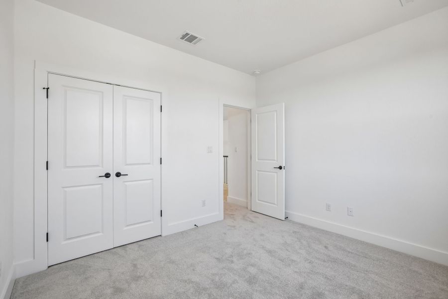 Representative unfurnished interior of a home built from the Anderson by Taylor Morrison in Easton Park, Austin (Image 42).