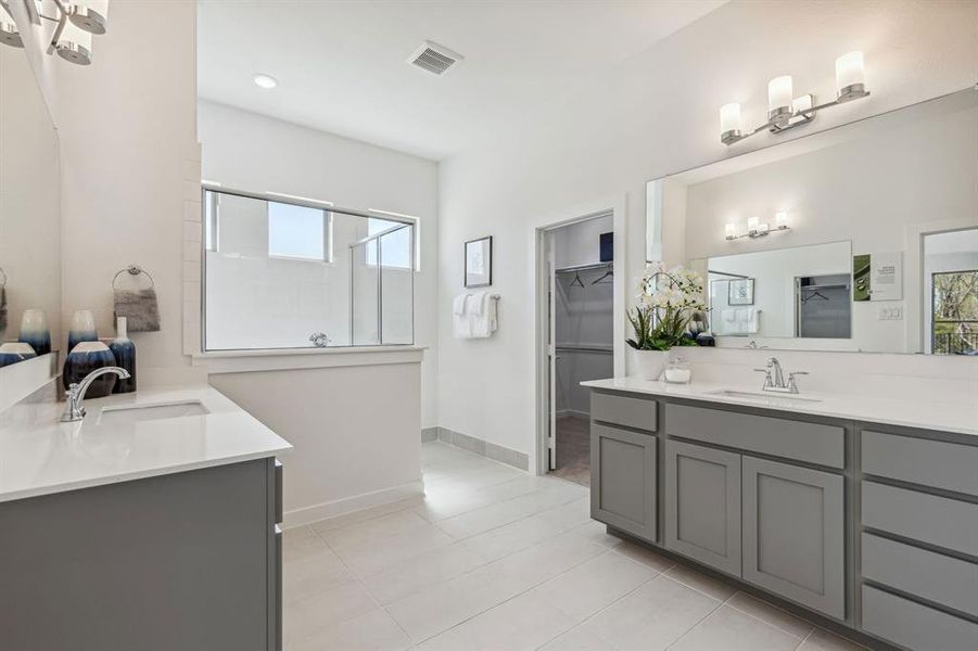 Primary Bathroom in the Van Gogh II home plan by Trophy Signature Homes – REPRESENTATIVE PHOTO