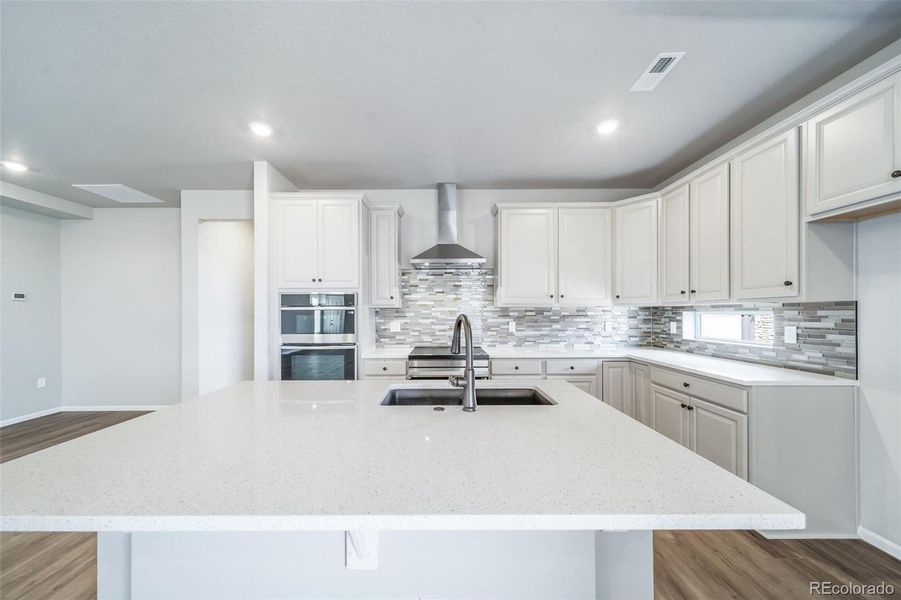 Furnished interior view inside a new home in The Reserve, Aurora (Image 4).