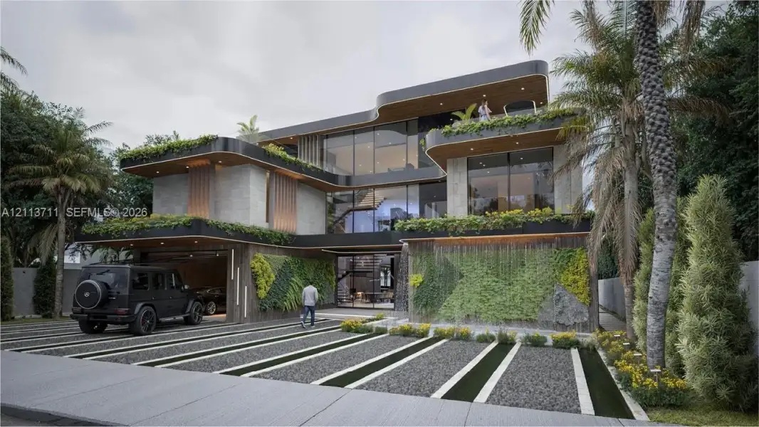 Contemporary three-story residence featuring expansive floor-to-ceiling glass paneling, integrated vertical garden walls, multi-level cantilevered balconies, and a built-in cascading water feature