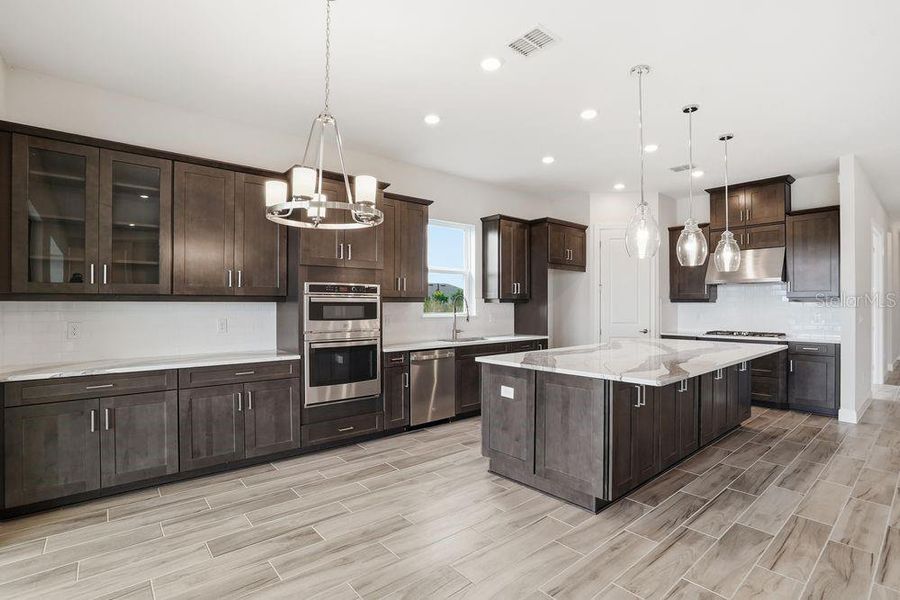 Furnished interior view inside a new home in Coasterra Community Group Page, Palmetto (Image 7).