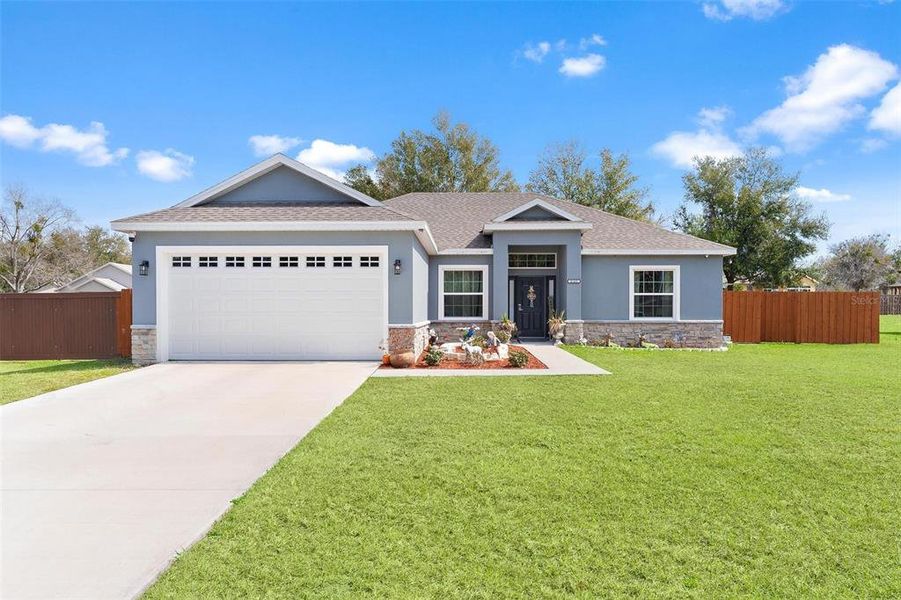 Front exterior of a new home in , Umatilla, FL, highlighting curb appeal (Image 27).
