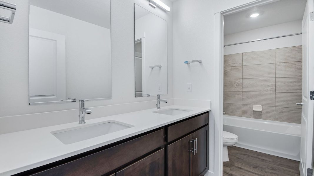 Furnished interior view inside a new home in Trails at Crowfoot, Parker (Image 17).