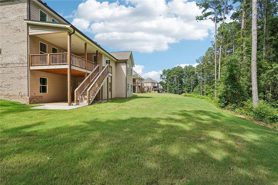 Front exterior of a new home in , Douglasville, GA, highlighting curb appeal (Image 16).