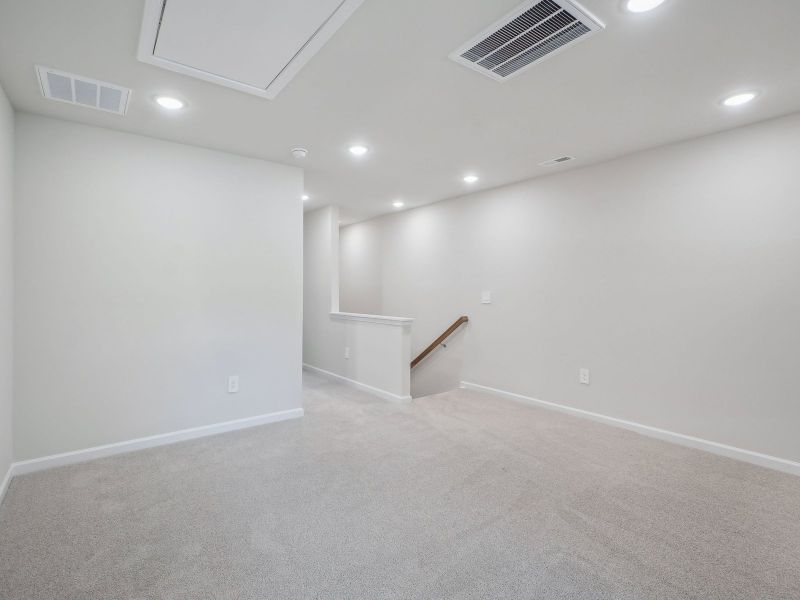 An upstairs loft lends itself to your own office space or homework area.