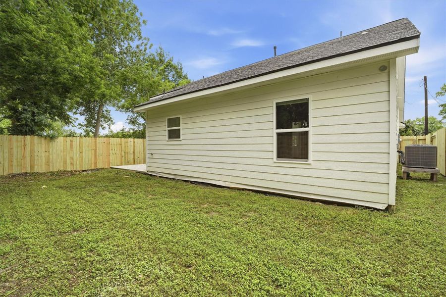 Spacious back yard, brand new privacy fence