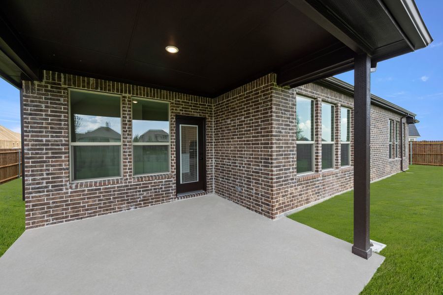 Exterior details and patio area of a home in Redden Farms, Midlothian (Image 3). Exterior details and patio area of a home in Redden Farms, Midlothian (Image 3).