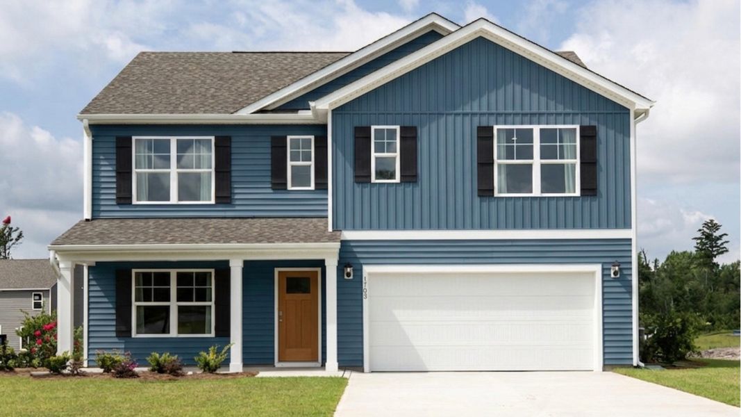 Front exterior of a new home in Sidbury Station, Castle Hayne, NC, highlighting curb appeal (Image 1). Front exterior of a new home in Sidbury Station, Castle Hayne, NC, highlighting curb appeal (Image 1).