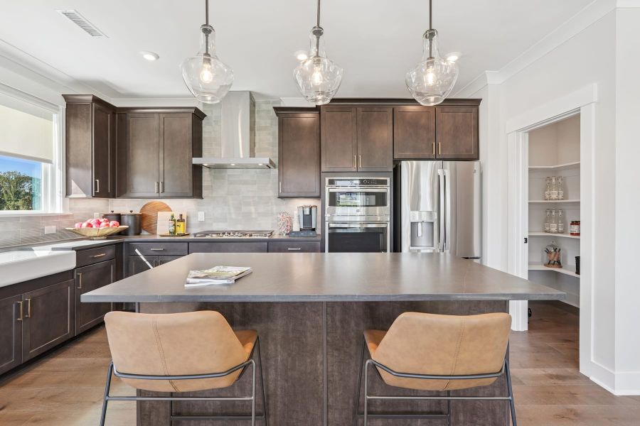 Representative furnished interior of a home built from the Wilson by Tri Pointe Homes in The Townes at NoVi, Pittsboro (Image 4).