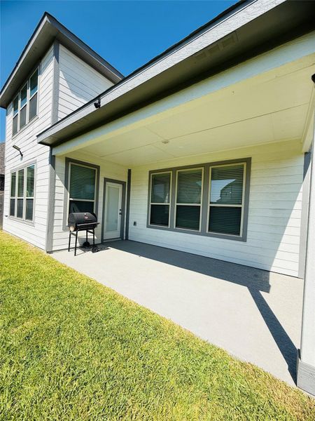 Front exterior of a new home in Mavera, Conroe, TX, highlighting curb appeal (Image 28).
