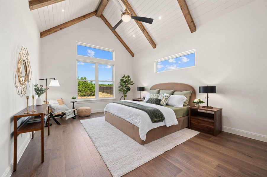 Bedroom with high vaulted ceiling, wood finished floors, ceiling fan, and beamed ceiling