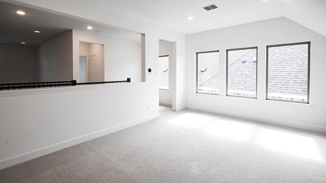 Spacious, unfurnished interior of a new home in 6 Creeks, Kyle (Image 11).