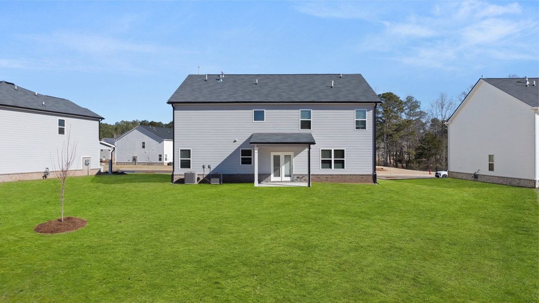 Representative exterior details of a home built from the Mansfield by D.R. Horton in Brooks Station, Dacula (Image 3).