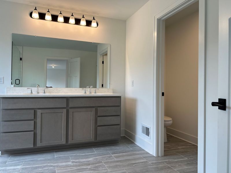 Representative exterior photo of a completed home built from the The Georgetown II Side Entry by Norfolk Homes in Fosdick Glen of Saline, Saline, MI (Image 20).