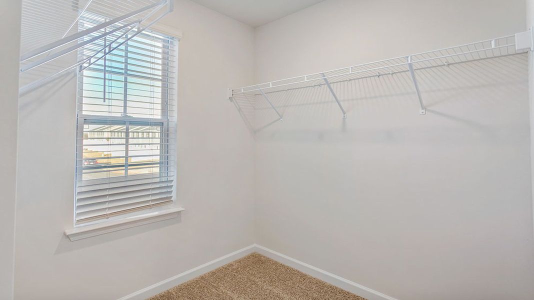 Representative unfurnished interior of a home built from the Maywood by D.R. Horton in The Gables at Edinborough Townes, Gibsonville (Image 19).