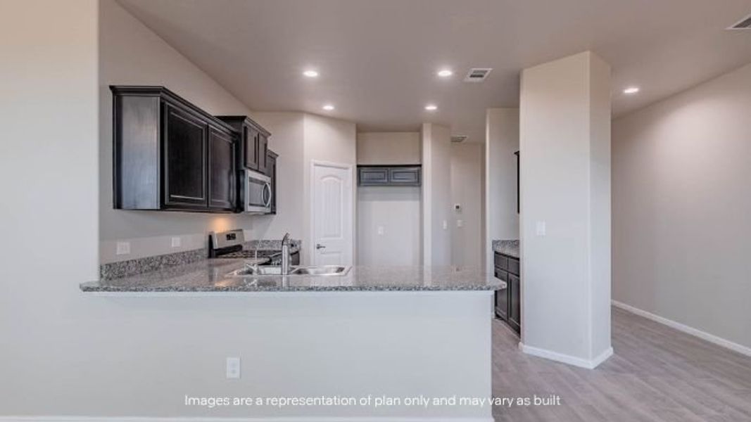 Furnished interior view inside a new home in Mustang Ridge, Andrews (Image 6).