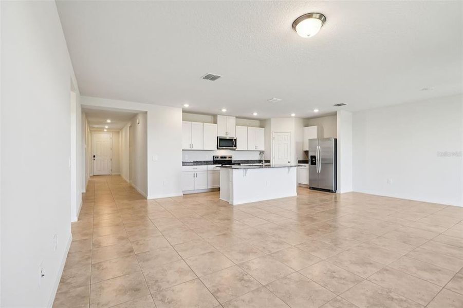 Spacious, unfurnished interior of a new home in Lake Deer Estates - Signature Series, Poinciana (Image 19).