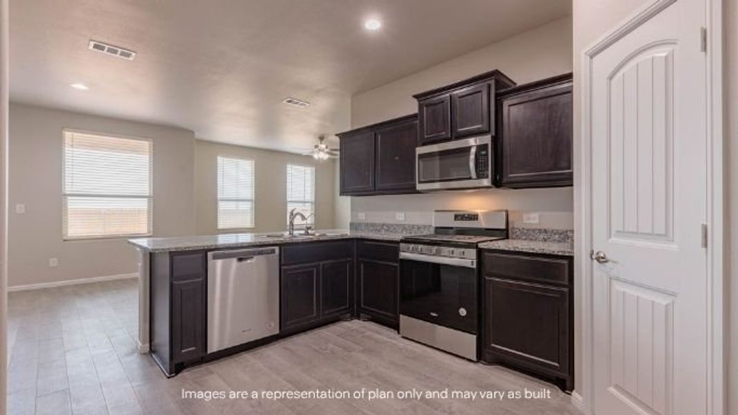 Furnished interior view inside a new home in Mustang Ridge, Andrews (Image 5).