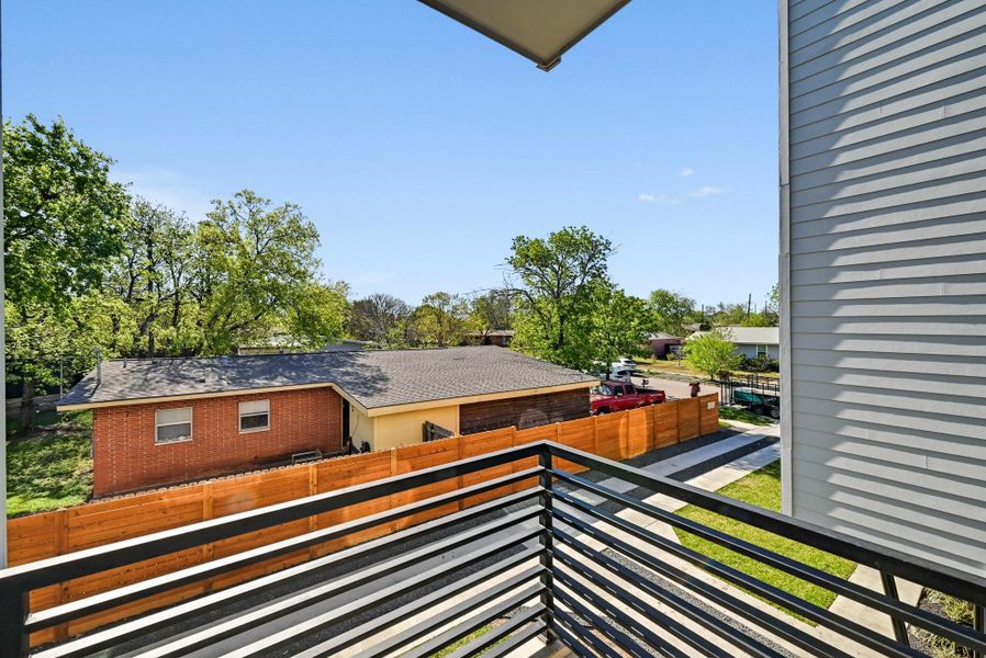 2nd Floor covered Balcony (This is Unit #2 - each Unit has the same layout, however a few differing details such as light fixtures, custom cabinet/backsplash/tile colors)
