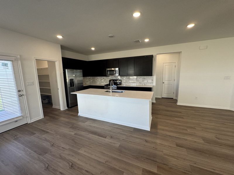 Furnished interior view inside a new home in Village at Three Oaks, Seguin (Image 8).