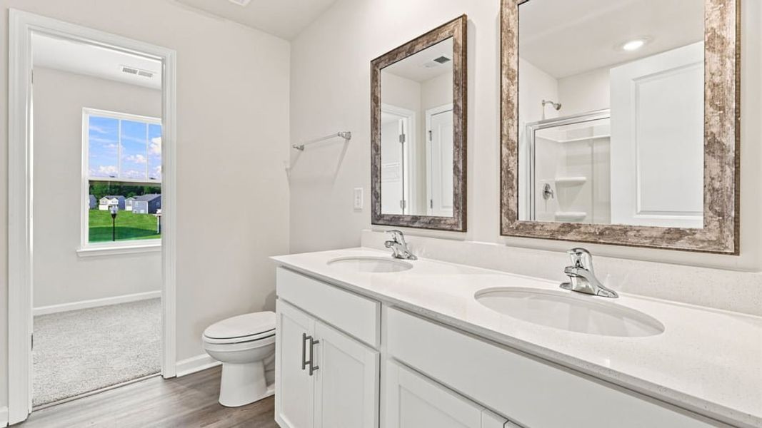 Furnished interior view inside a new home in Harper Ridge, Roebuck (Image 11).