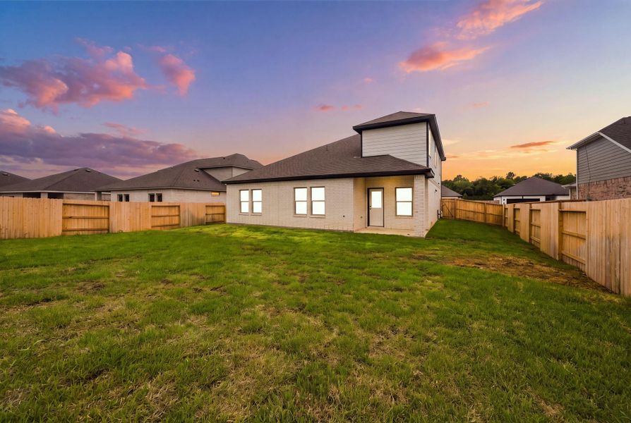 Exterior details and patio area of a home in Windcress, Cove (Image 4).