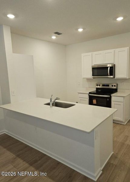 Furnished interior view inside a new home in Liberty Cove, Yulee (Image 6).