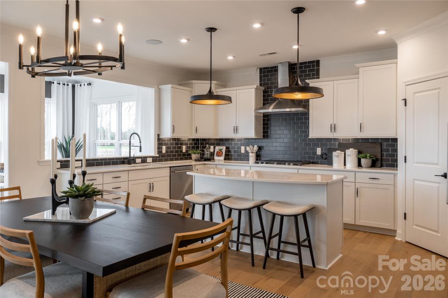 Not actual home. Photos of Riverton plan model home.