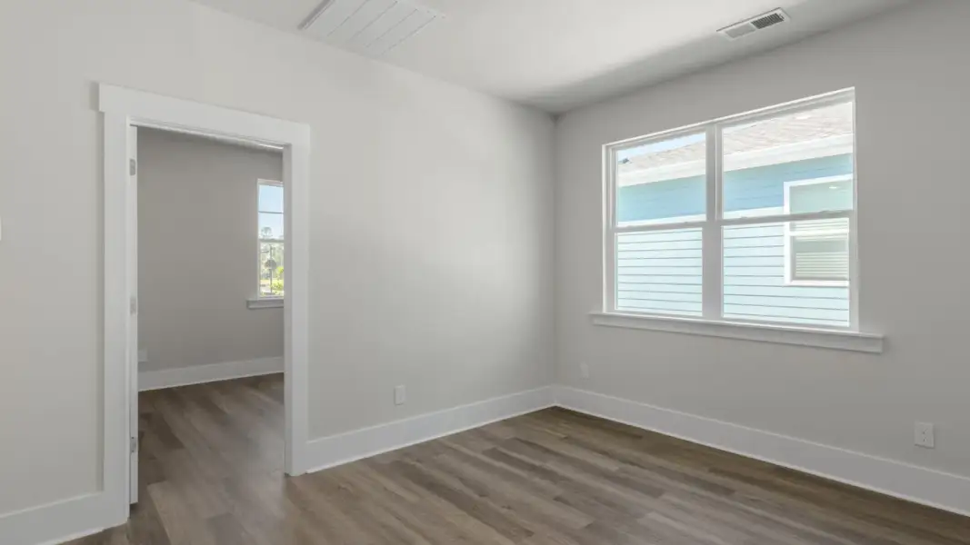 Spacious, unfurnished interior of a new home in The Retreat at Indigo Preserve Townhomes, Leland (Image 12).