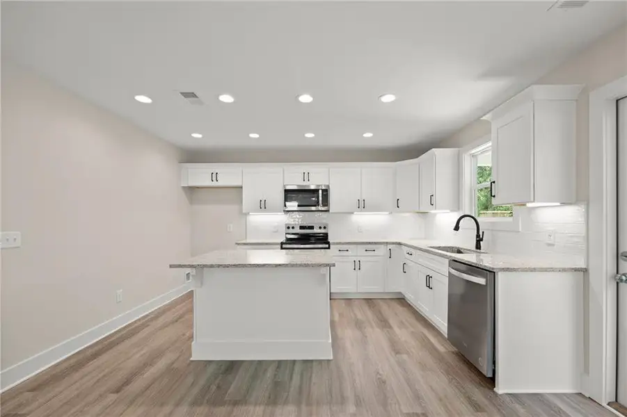 Furnished interior view inside a new home in , Cumming (Image 4).