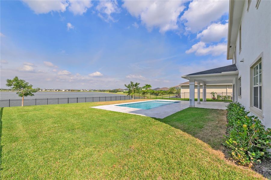 Exterior details and patio area of a home in Arden: The Waterford Collection, Loxahatchee (Image 32).