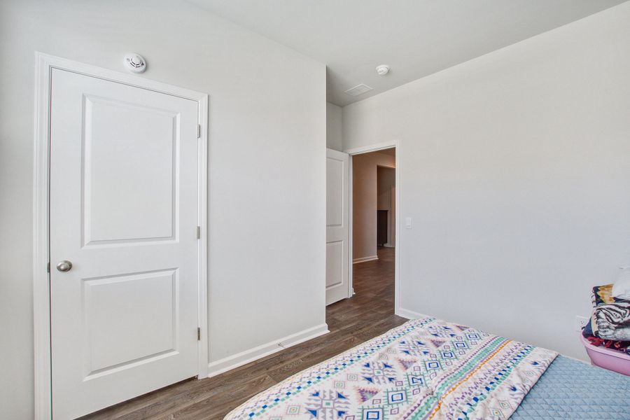 Furnished interior view inside a new home in Pine Hills at Cane Bay, Summerville (Image 38).
