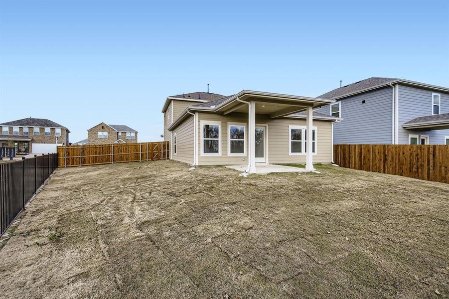 Exterior details and patio area of a home in Ambergrove, Royse City (Image 21).