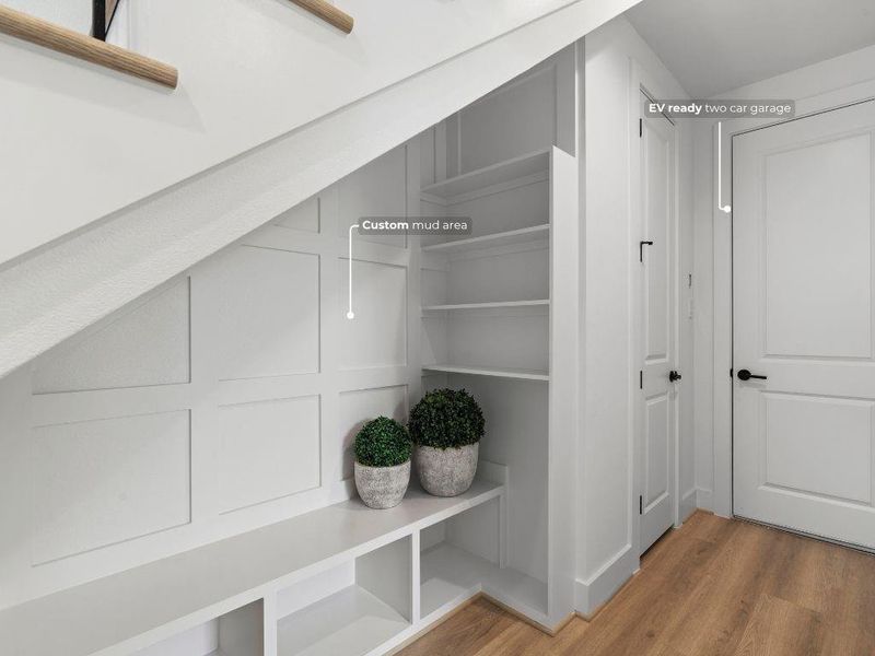 Coming in from the garage, you’ll find a coat closet and built-in mudroom area, ideal for dropping bags and shoes as you walk in.