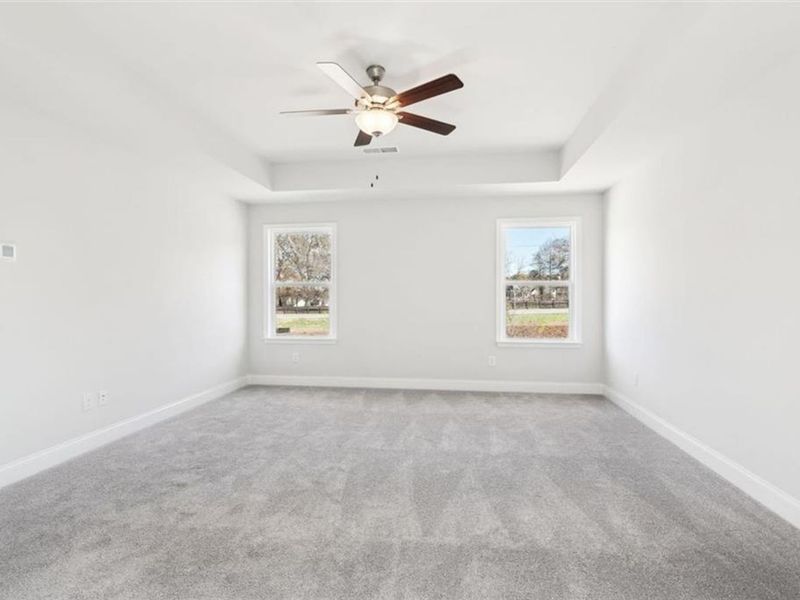 Spacious, unfurnished interior of a new home in Wehunt Meadows, Hoschton (Image 61).