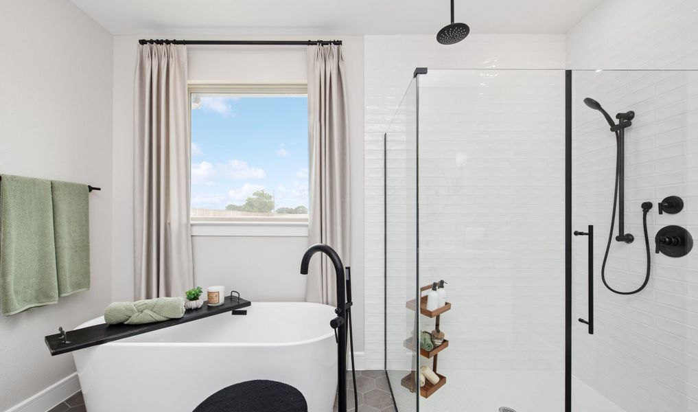 Freestanding tub and glass shower enclosure