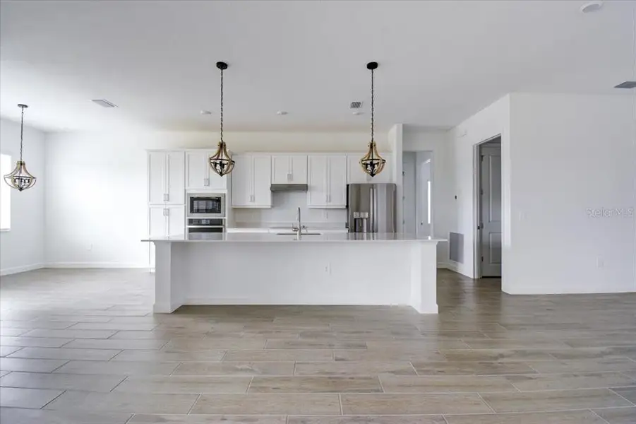 Furnished interior view inside a new home in Harbor East, Port Charlotte (Image 6).
