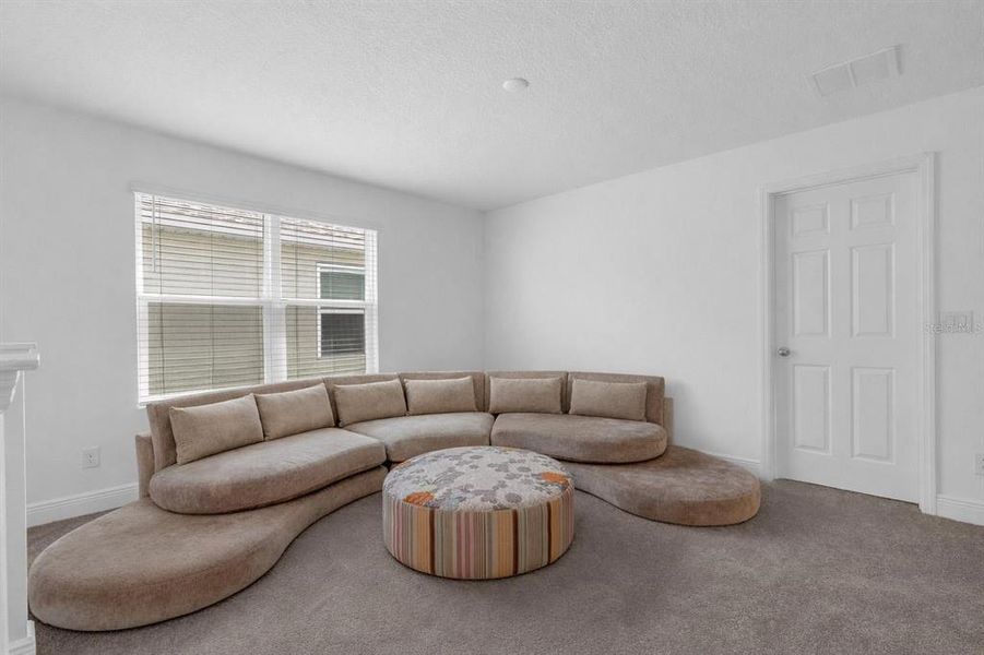 Furnished interior view inside a new home in Ridgeview, Clermont (Image 25).