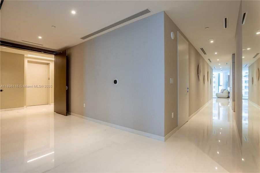 Spacious, unfurnished interior of a new home in Aston Martin Residences, Miami (Image 22). Spacious, unfurnished interior of a new home in Aston Martin Residences, Miami (Image 22).