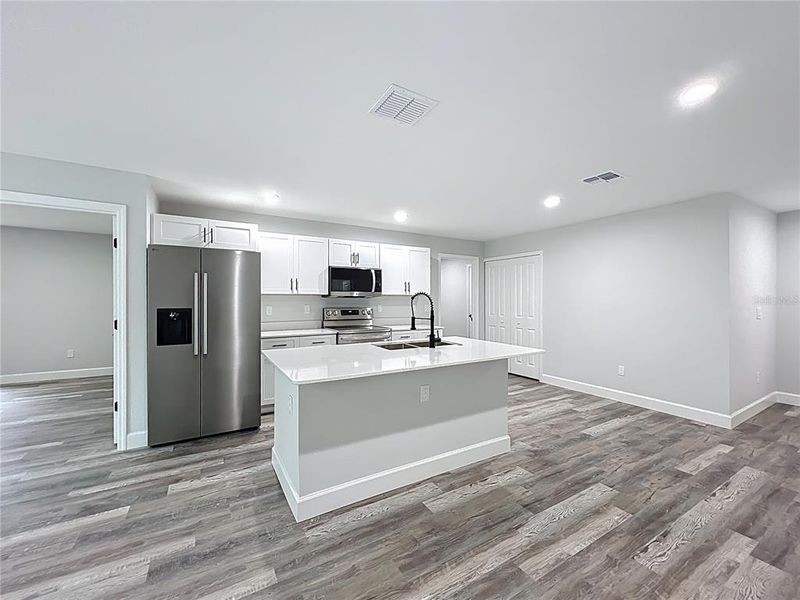 Furnished interior view inside a new home in , Ocala (Image 11).