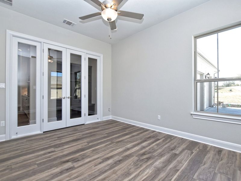 Representative unfurnished interior of a home built from the Siena III by Giddens Homes in Clearwater Ranch, Liberty Hill (Image 240).