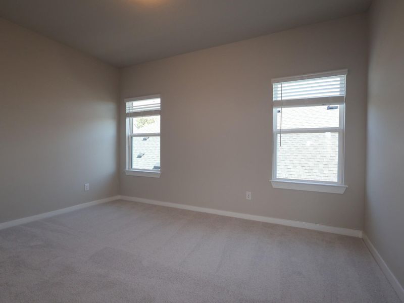 Spacious, unfurnished interior of a new home in Heritage, Dripping Springs (Image 10).