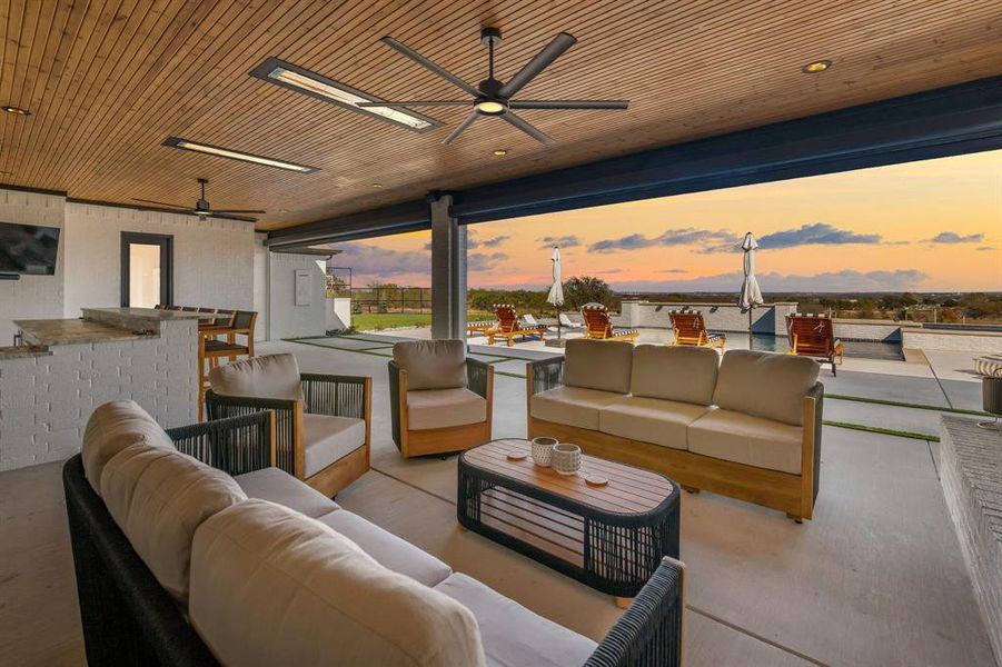 View of patio / terrace featuring an outdoor living space and ceiling fan View of patio / terrace featuring an outdoor living space and ceiling fan