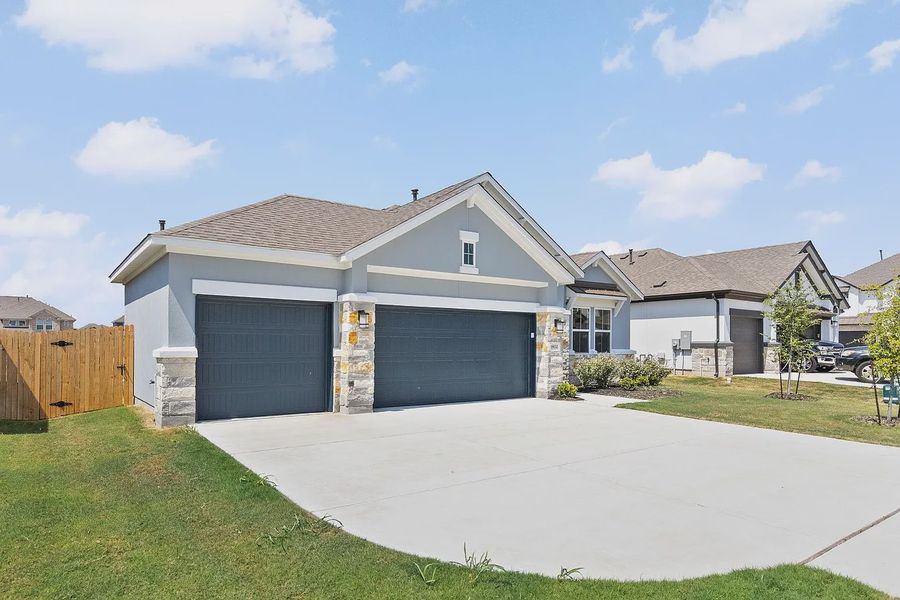 Front exterior of a new home in Enclave at Cele, Pflugerville, TX, highlighting curb appeal (Image 22).