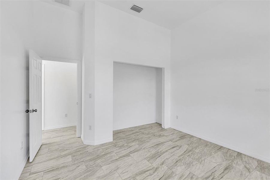 Spacious, unfurnished interior of a new home in , Port Charlotte (Image 32).