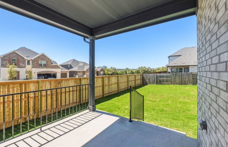 Exterior details and patio area of a home in Crescent Bluff, Georgetown (Image 3).